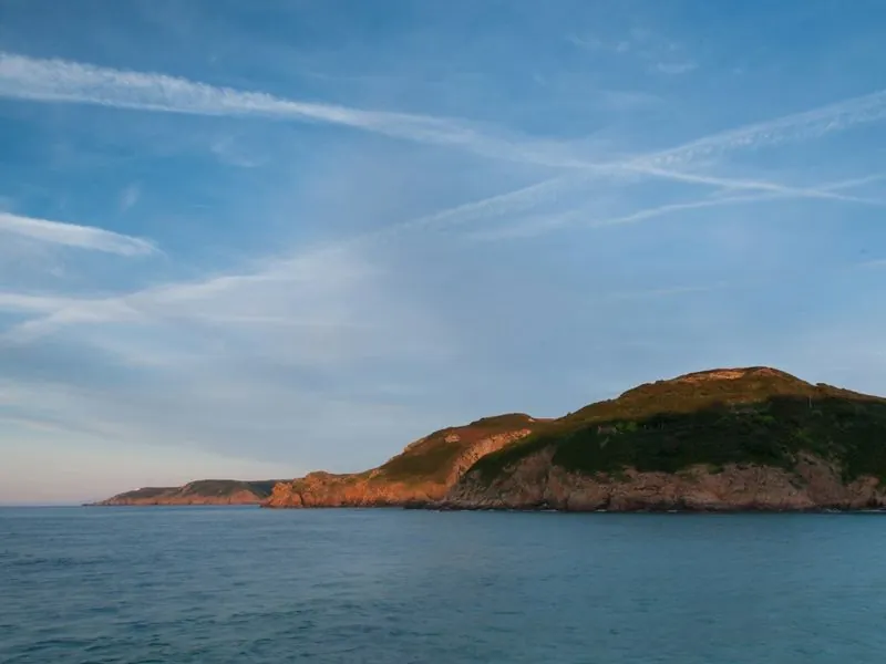 Evening light over the sea at Grève de Lecq, Jersey